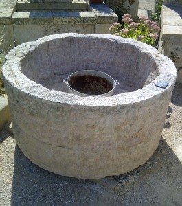 Green Reused Round Stone Well